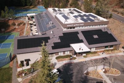 Aerial view of rooftop solar installation.